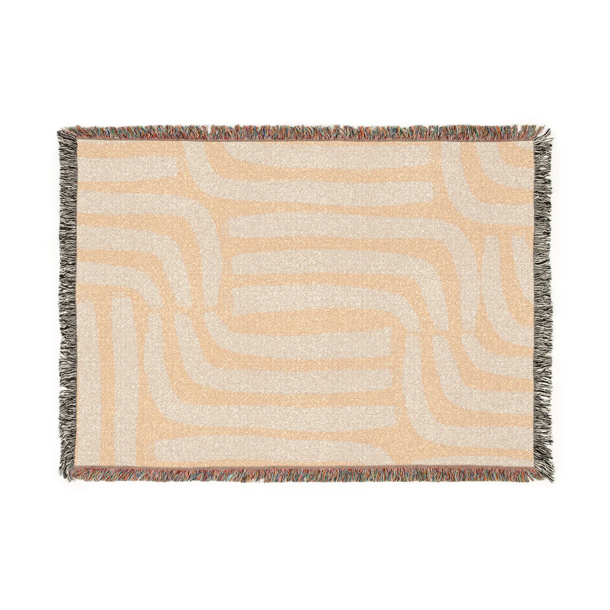 Woven blanket with geometric pattern on a white background