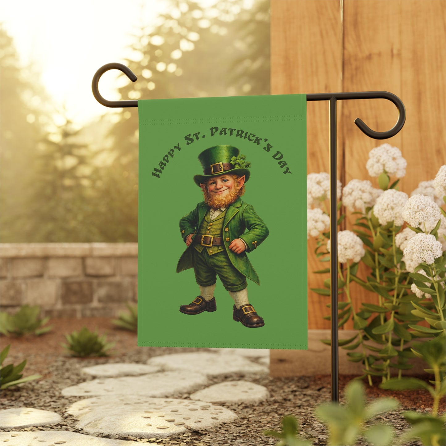 Garden flag with a leprechaun design and 'Happy St. Patrick's Day' text, attached to a flagpole outdoors.