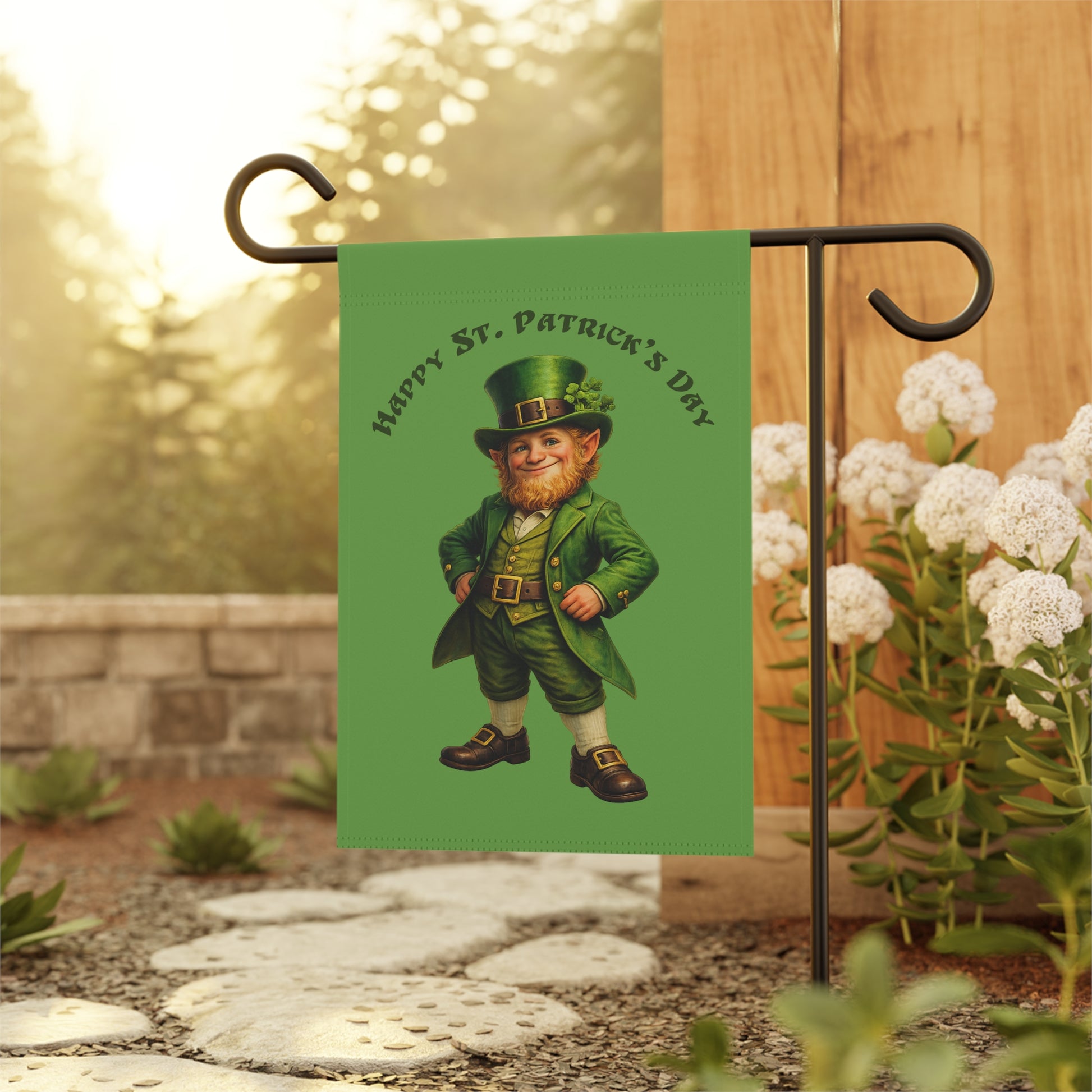 Garden flag with a leprechaun design and 'Happy St. Patrick's Day' text, attached to a flagpole outdoors.