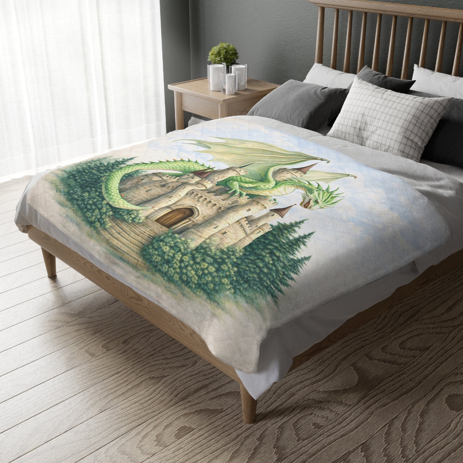 Bed with a dragon and castle design blanket in a bedroom setting