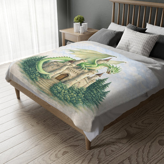 Bed with a dragon and castle design blanket in a bedroom setting