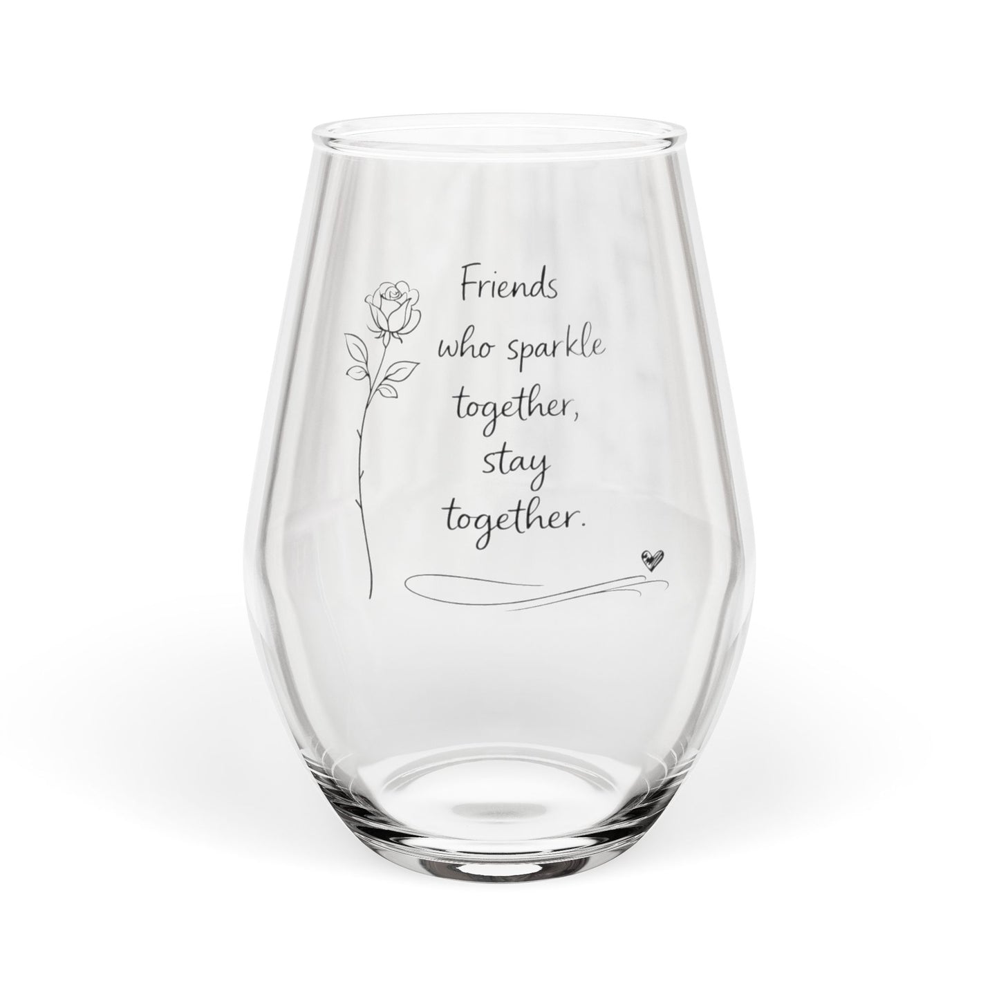 Clear glass with engraved text and a rose design on a white background