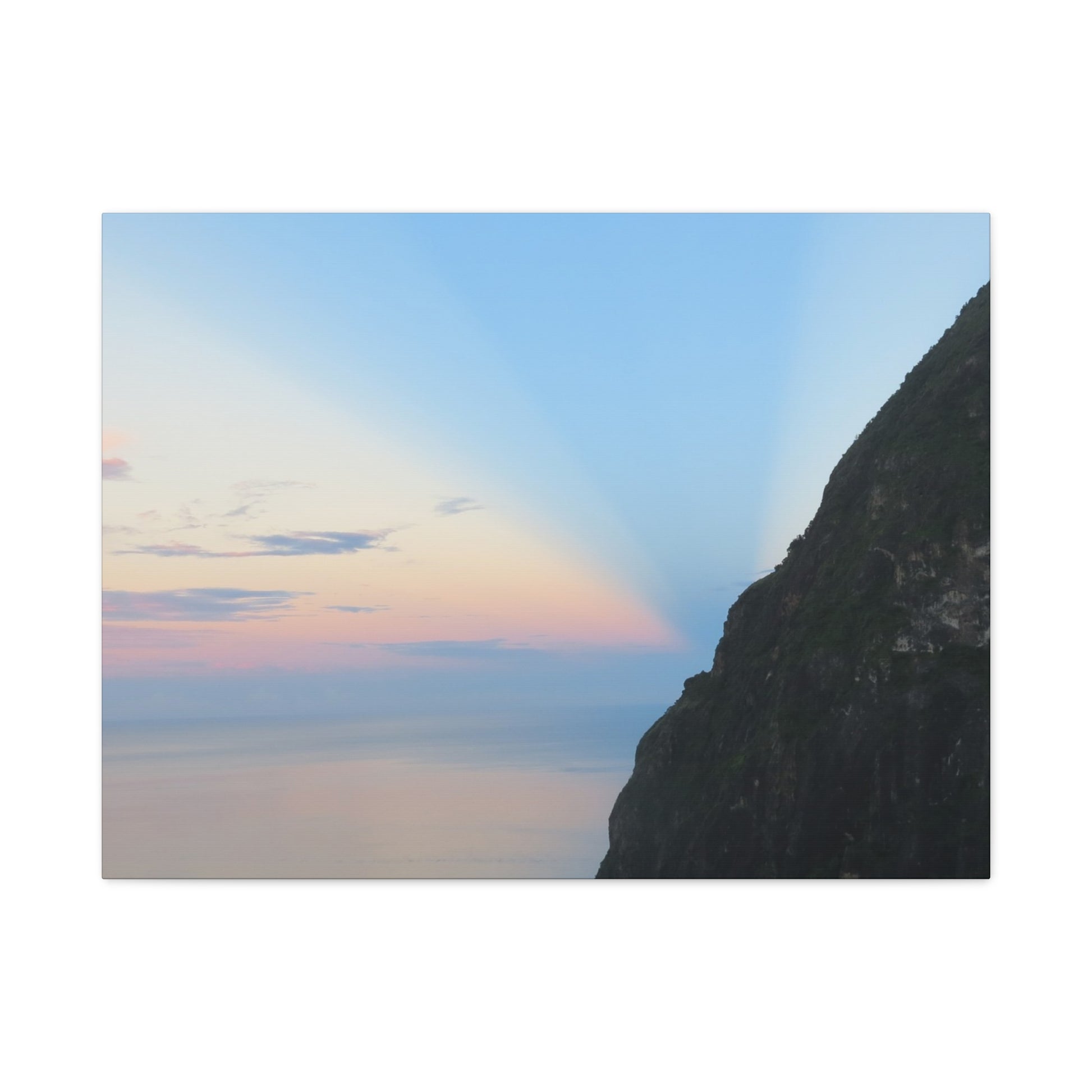 Mountain peak with a colorful sky