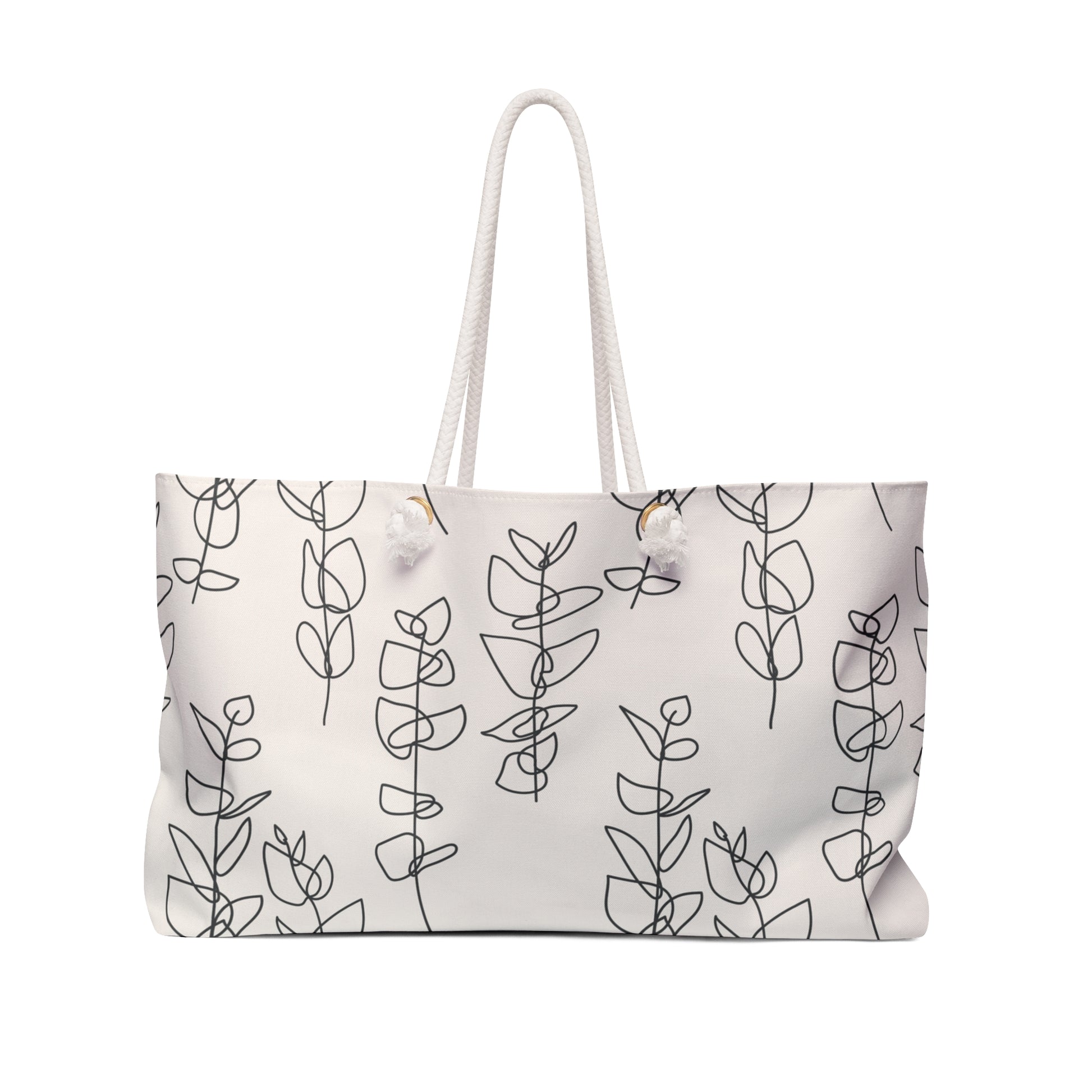 Tote bag with black leaf pattern on a white background
