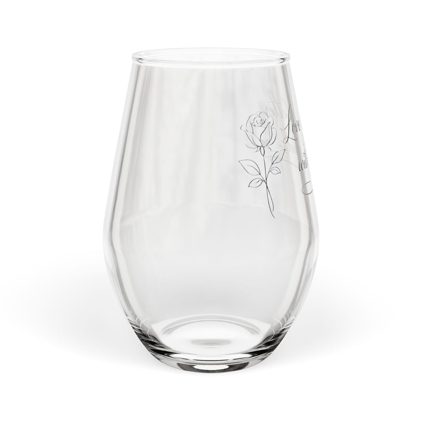 Clear glass with a rose engraving on a white background