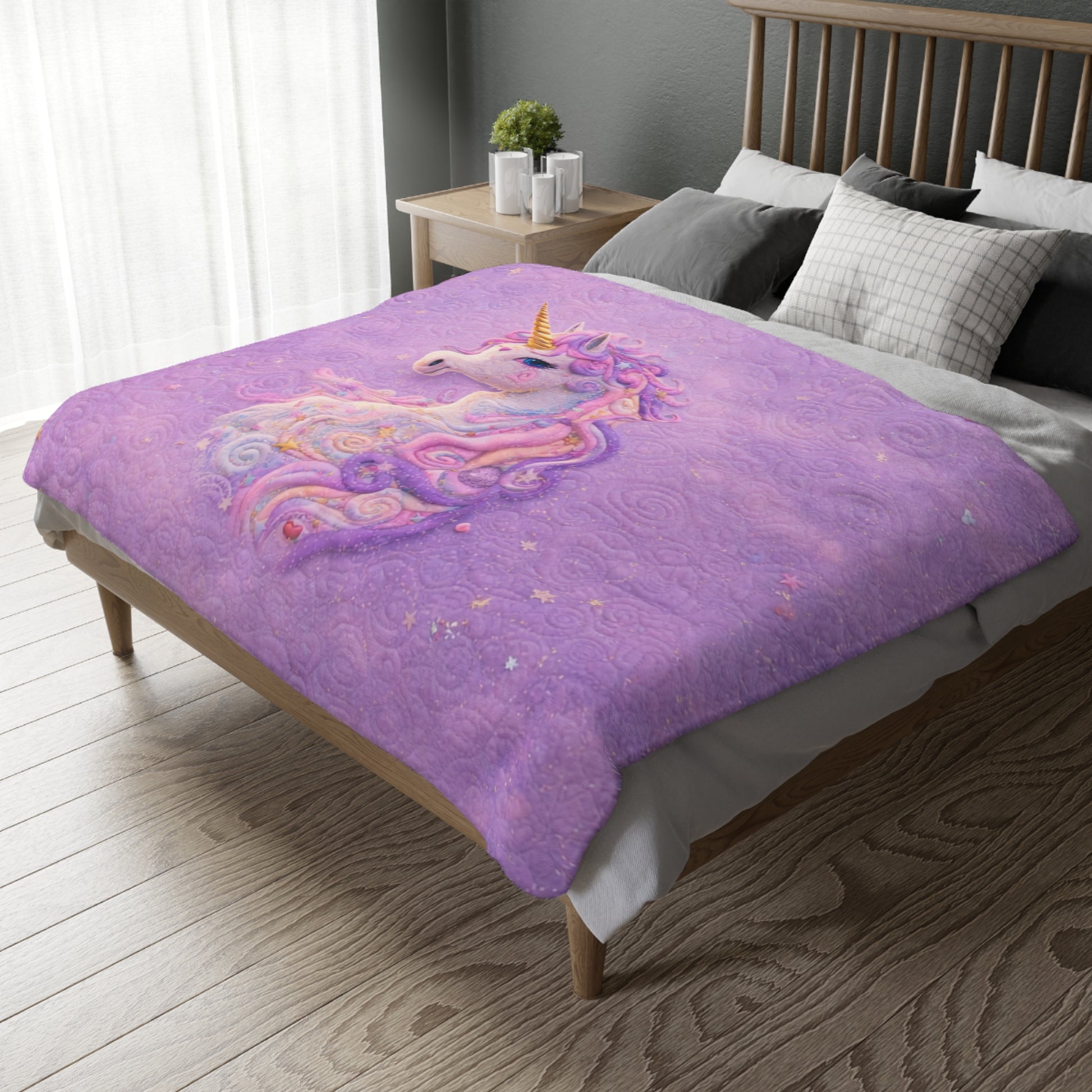 Purple unicorn blanket on a bed in a bedroom setting