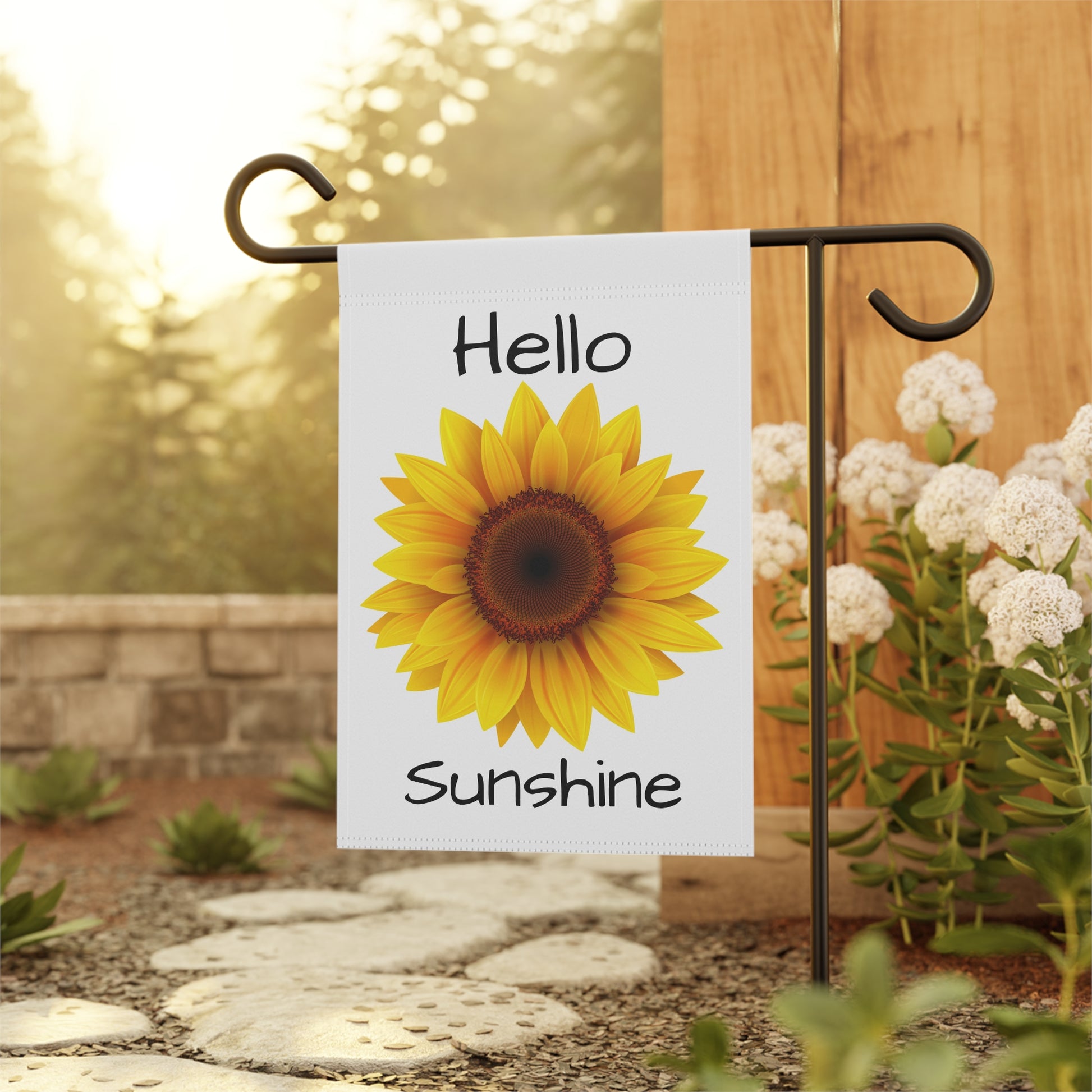 Garden flag with sunflower and 'Hello Sunshine' text on a stand outdoors.
