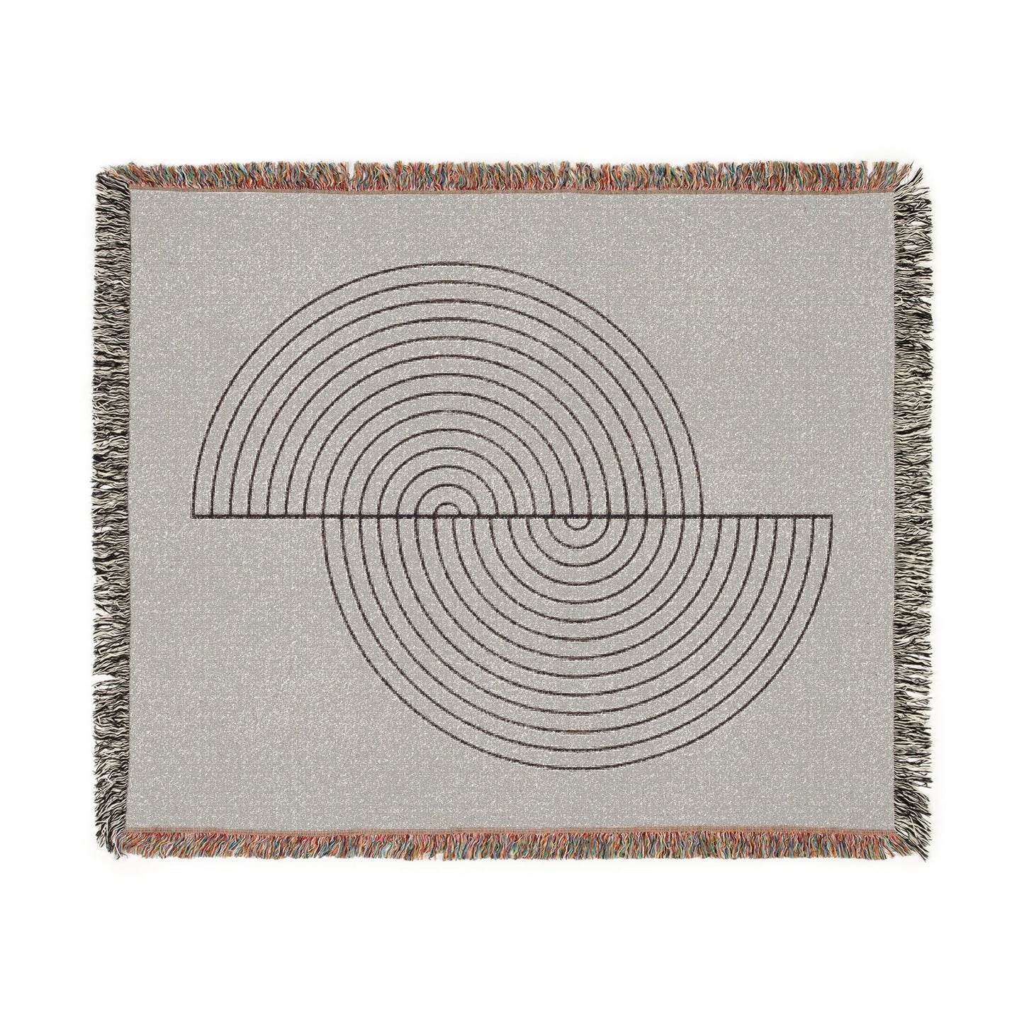 Woven blanket with geometric pattern on a plain background