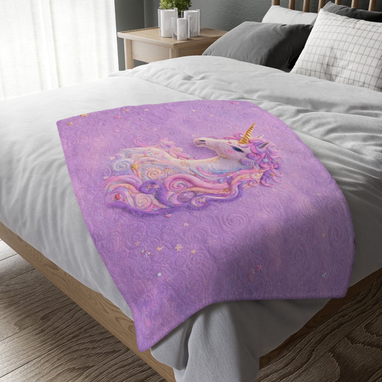 Purple blanket with a unicorn design on a bed in a bedroom setting