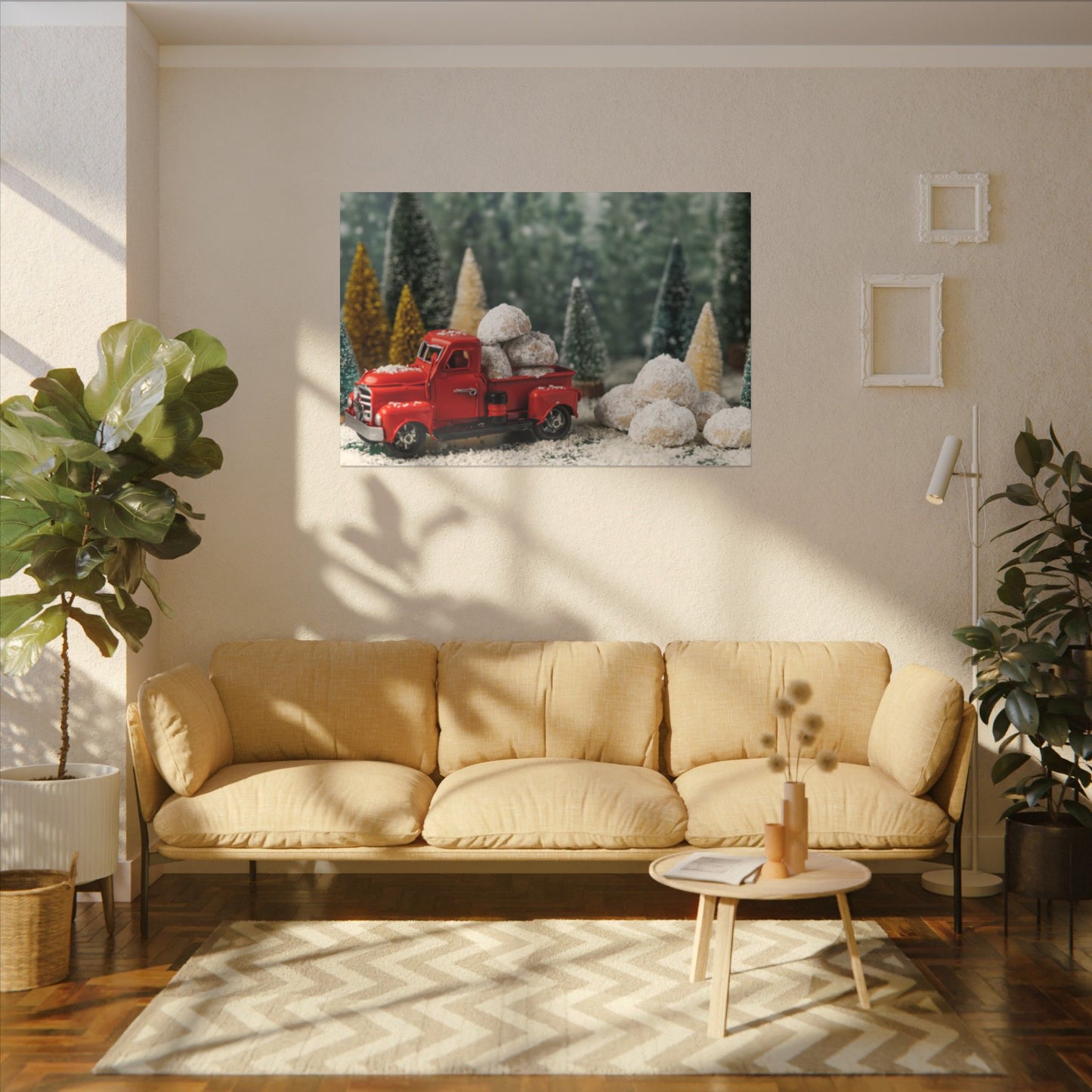 Living room with beige sofa, coffee table, and decorative wall art of a red truck.