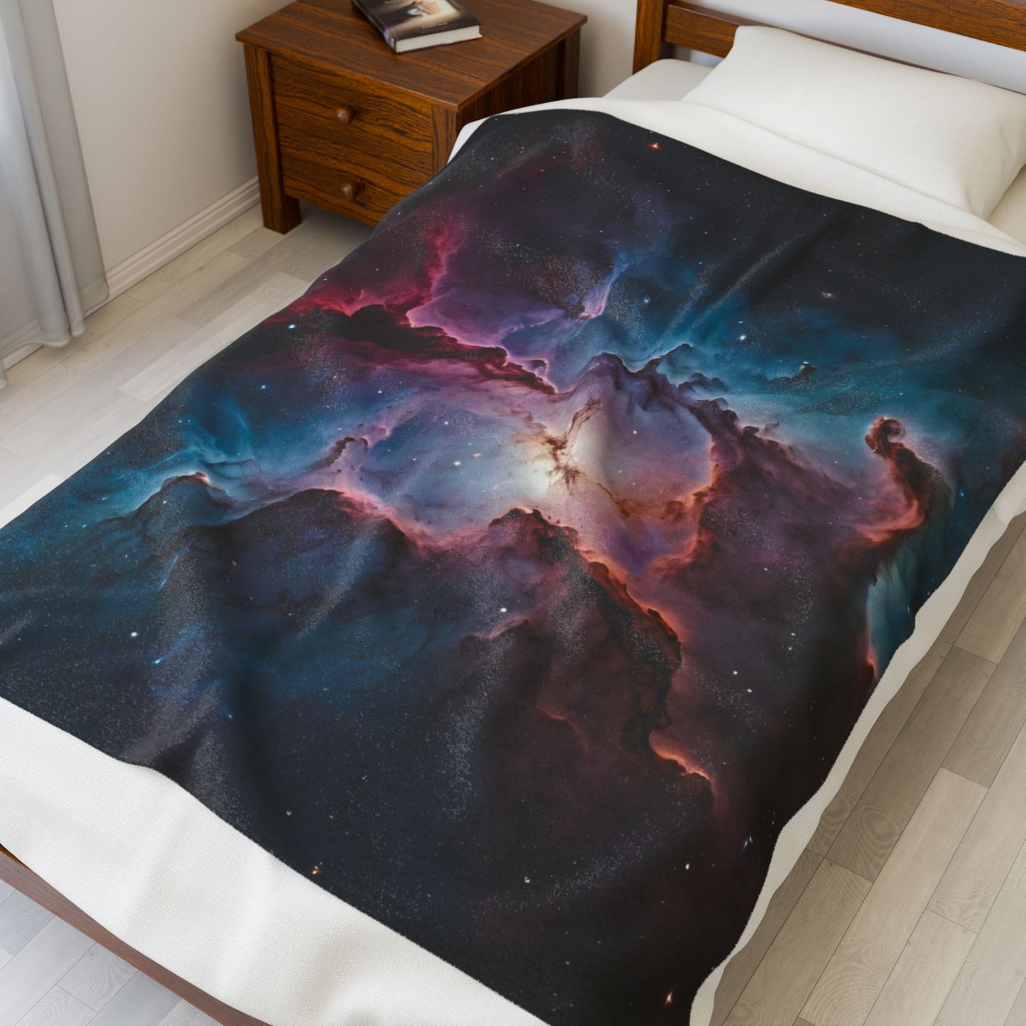 Neon galaxy blanket draped over a bed in a bedroom setting