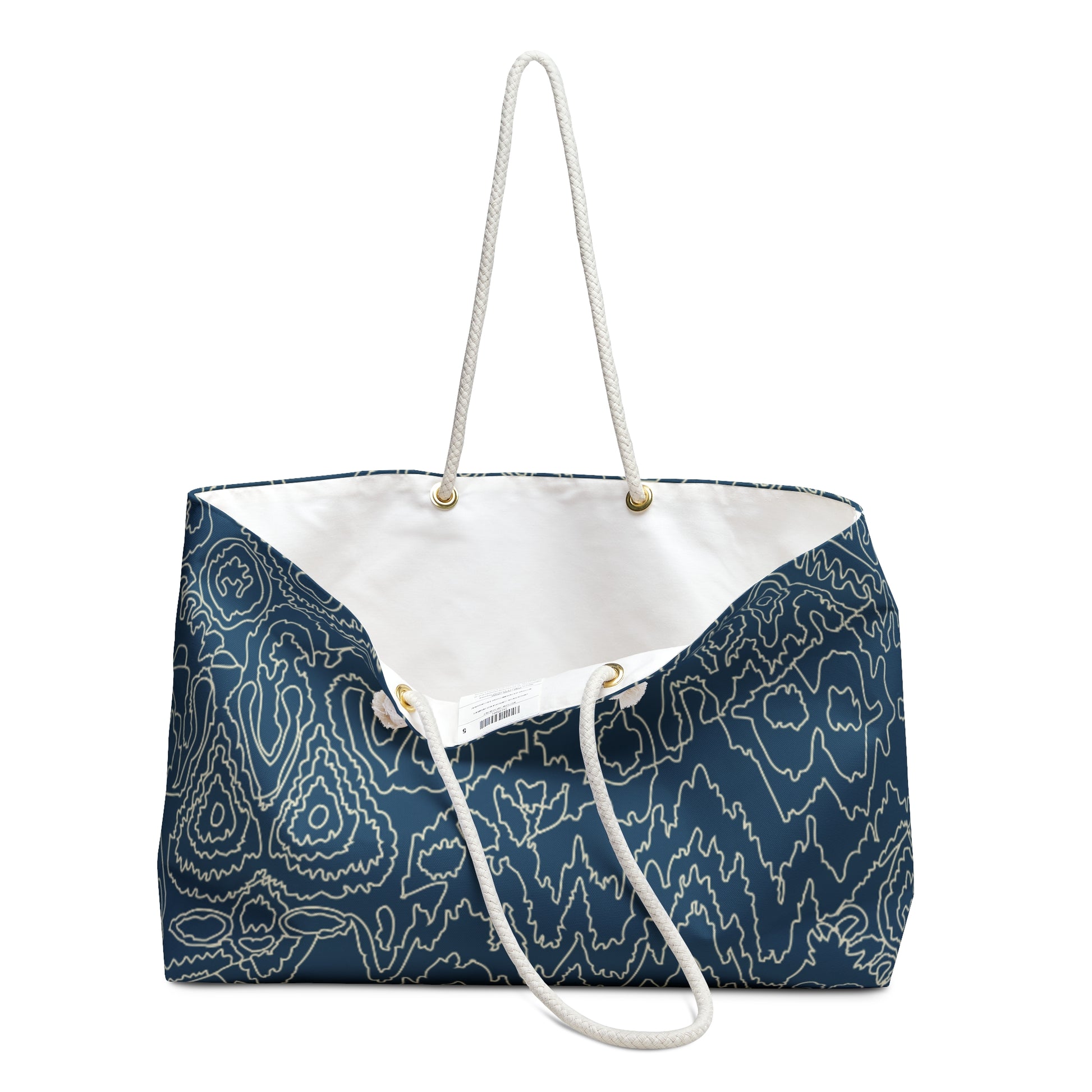 Blue patterned tote bag with white drawstring on a white background