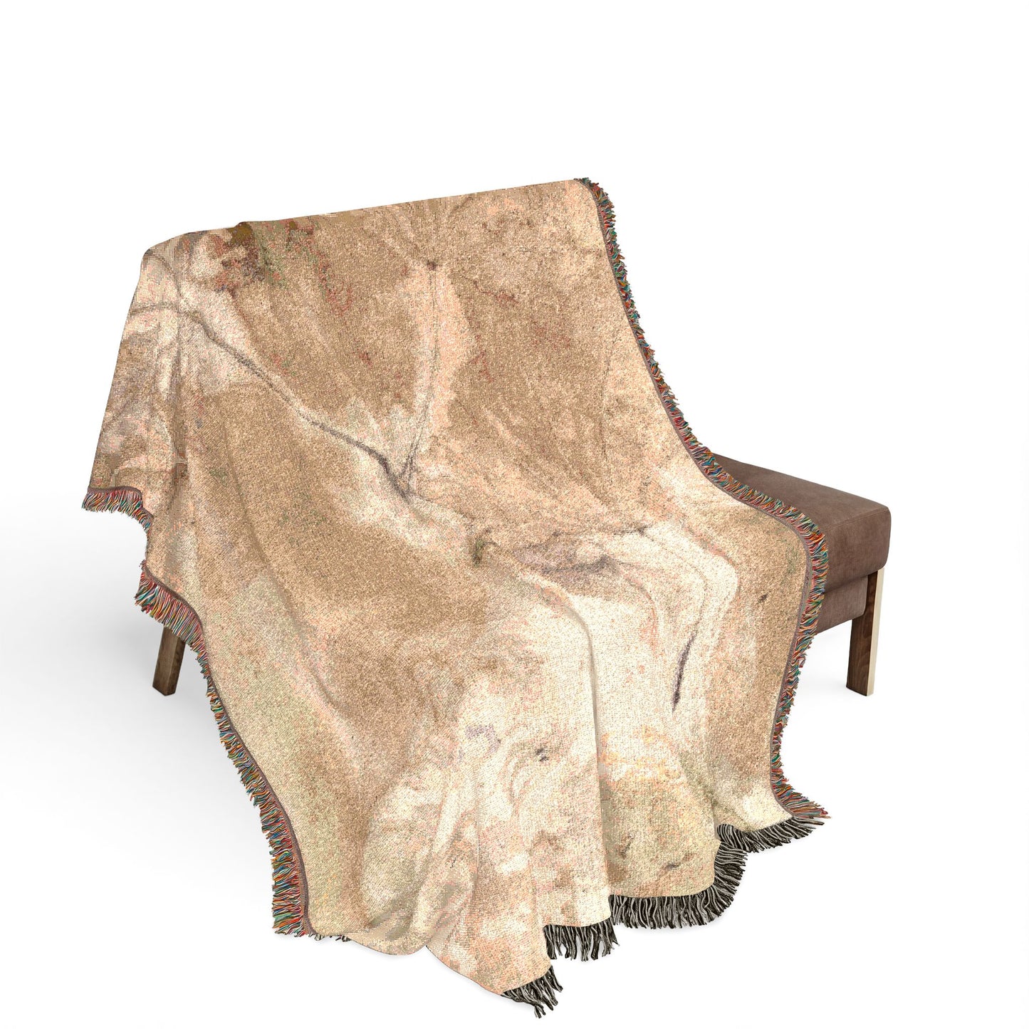 Beige textured throw blanket draped over a brown chair on a white background