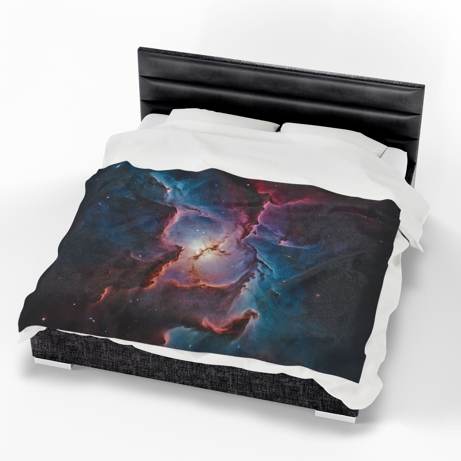 Neon galaxy bedding set on a bed with a black headboard.