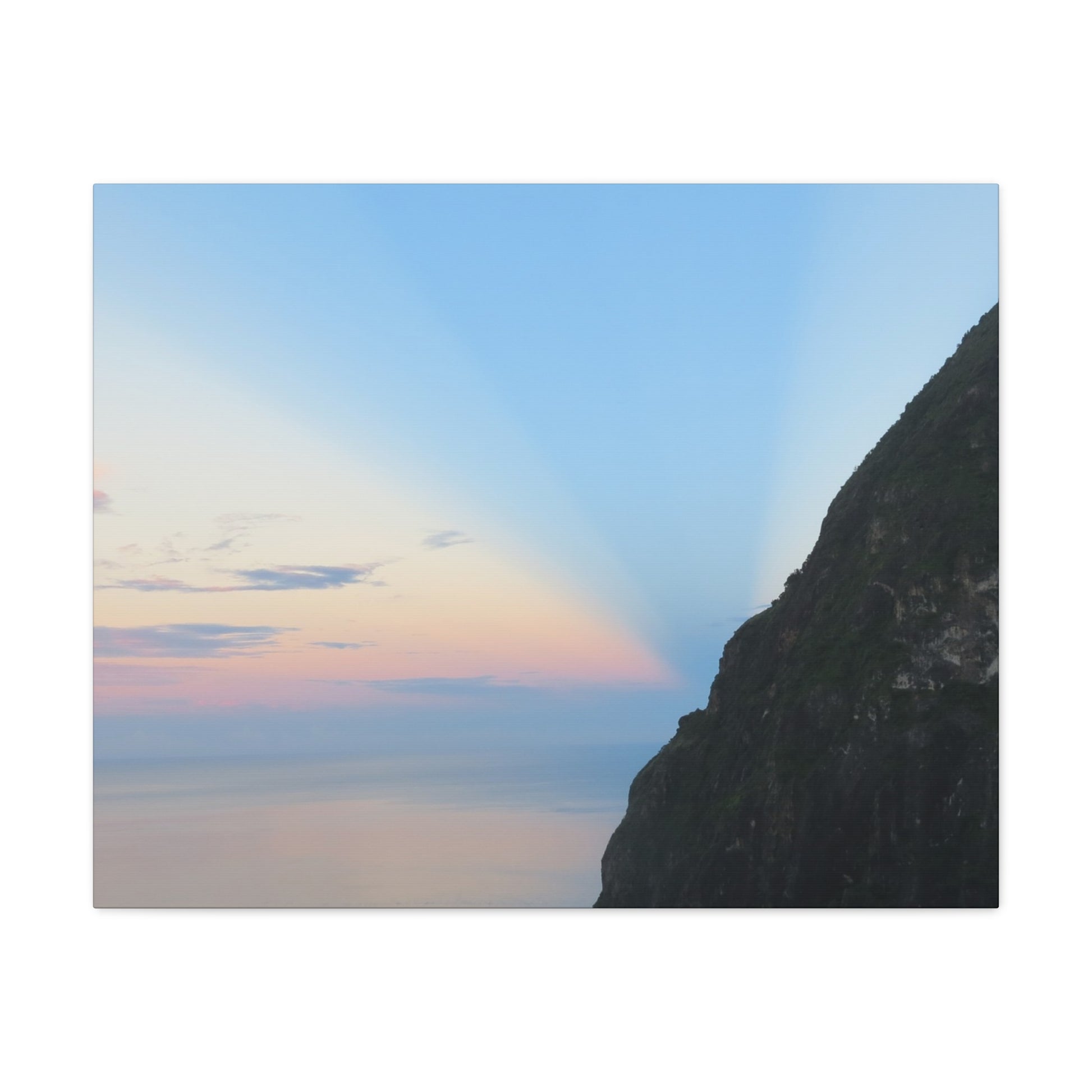 Mountain peak with a colorful sky