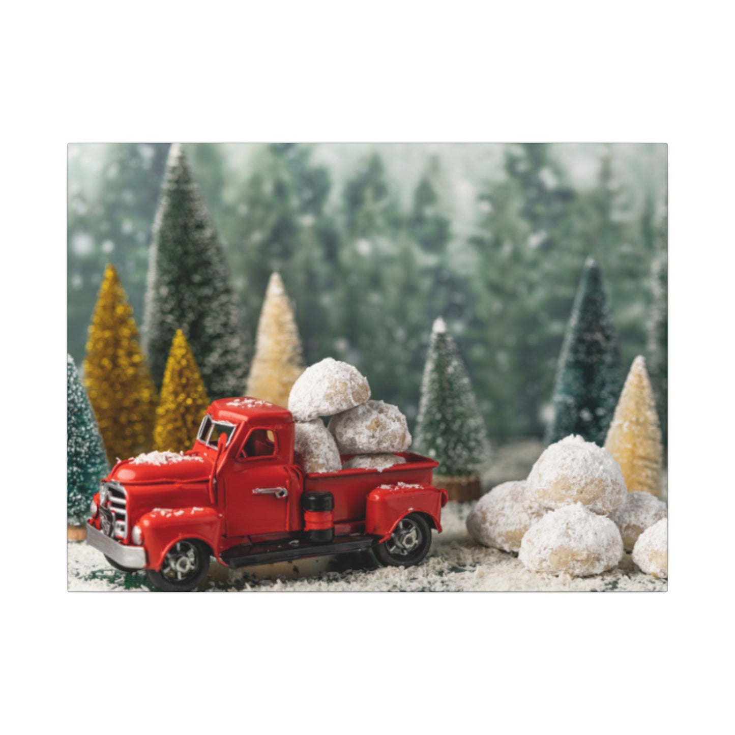Red toy truck with snow-covered trees and rocks in a snowy forest setting