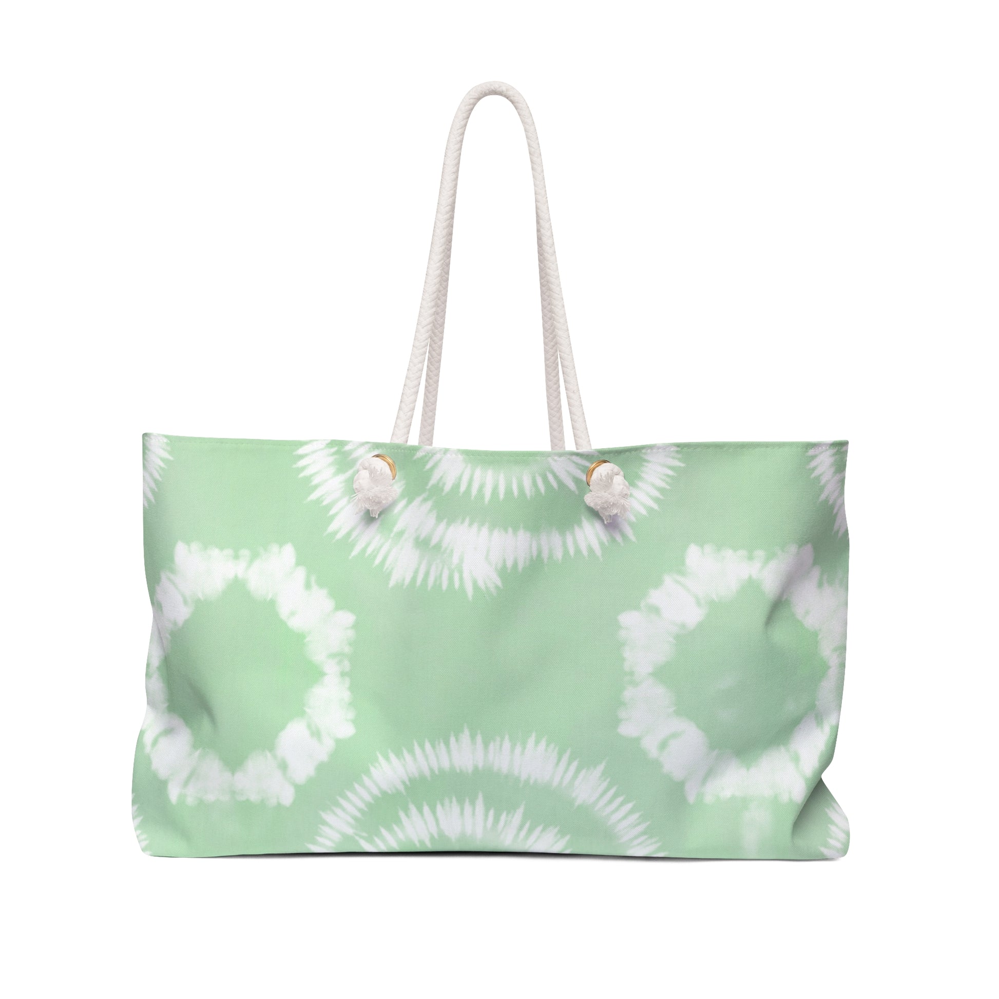 Tie-dye patterned bag with seashells on a white background