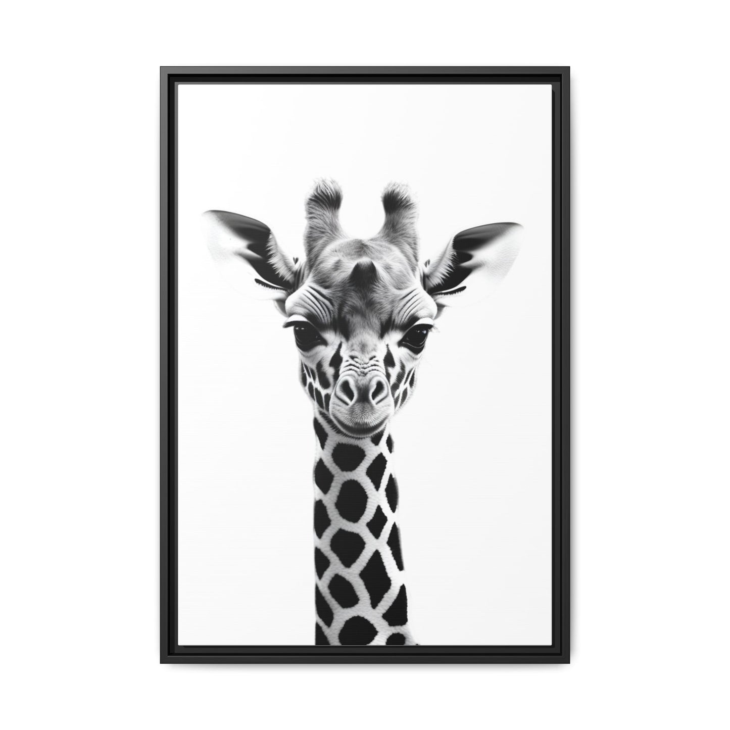 Framed black and white photo of a giraffe's face on a white background
