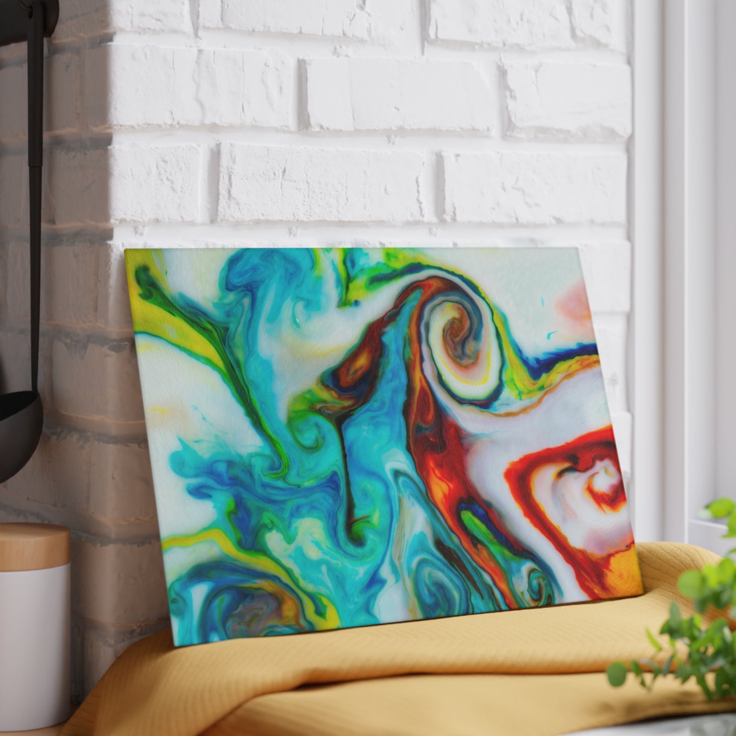 Colorful abstract painting on a white brick wall