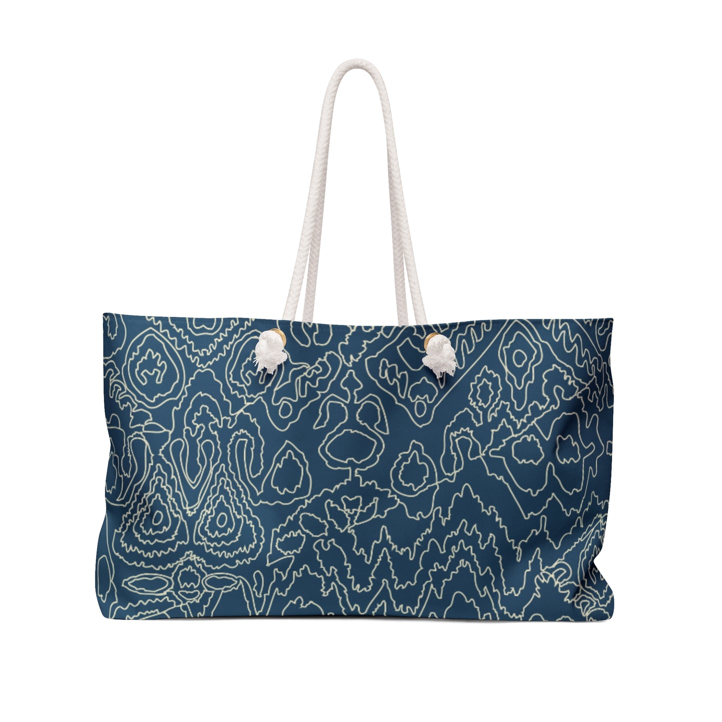 Blue patterned bag with white handles on a white background