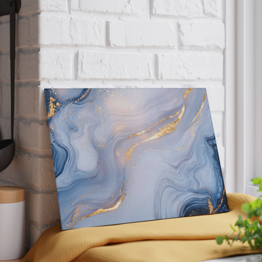 Blue marbled art piece with gold accents on a white brick wall background