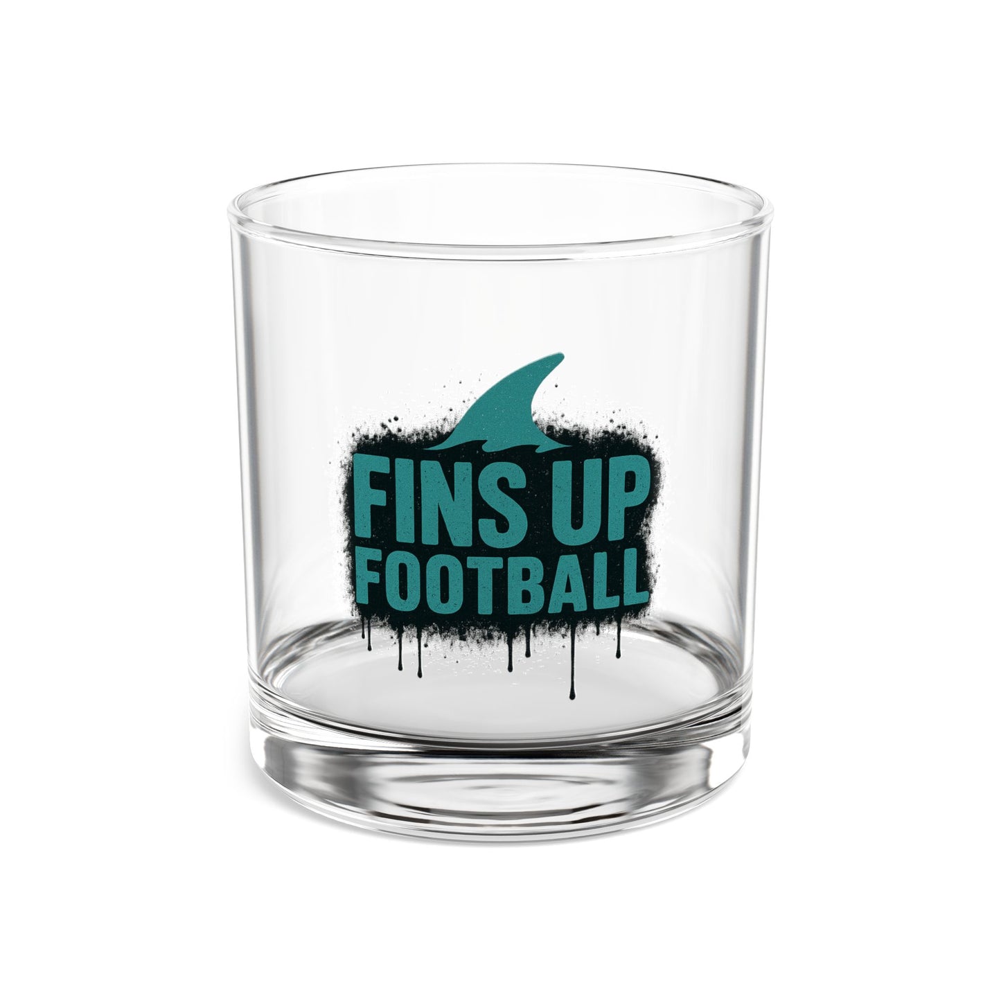 Clear glass tumbler with 'FINS UP FOOTBALL' text and shark fin design on a white background