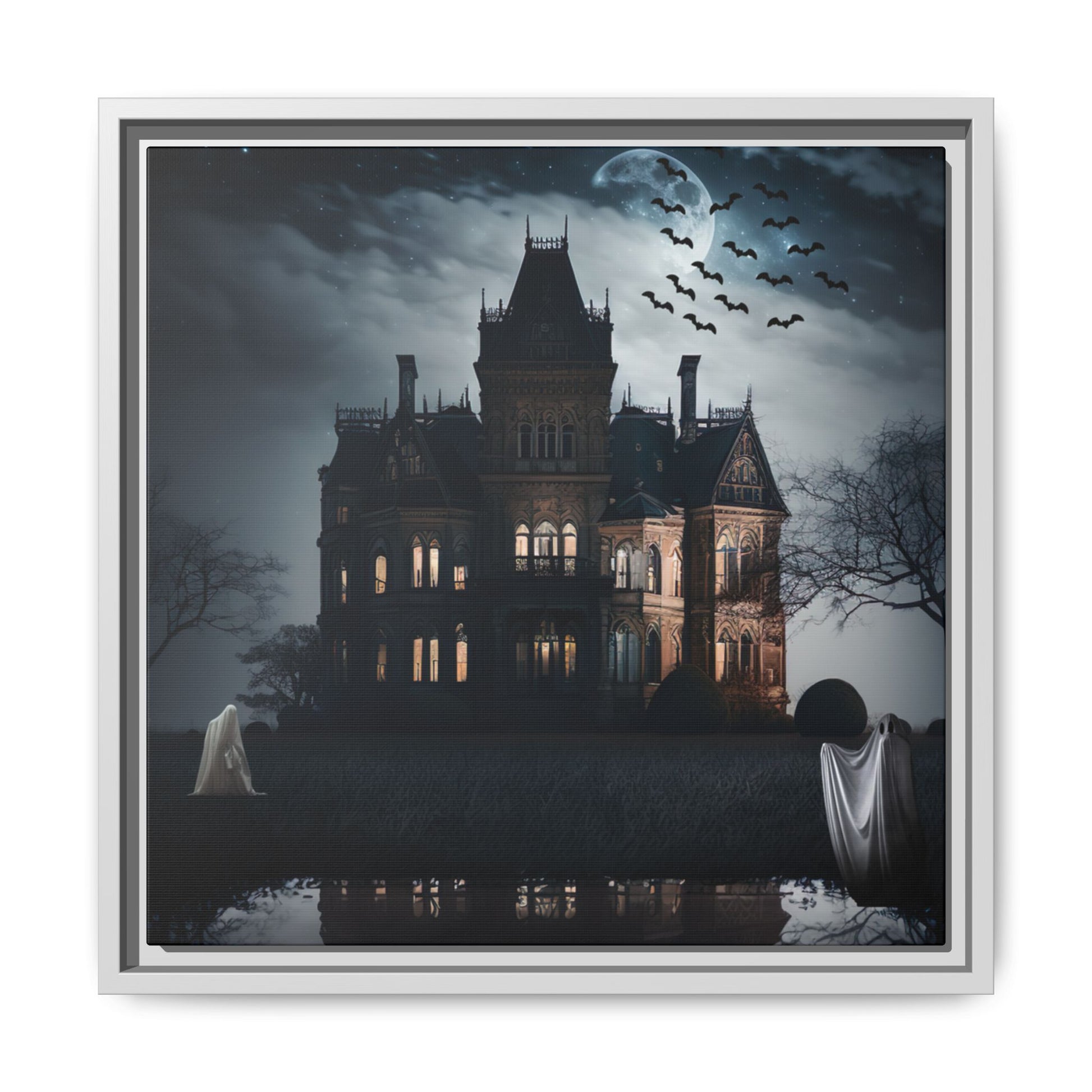 Framed artwork of a haunted house with ghosts and bats at night.