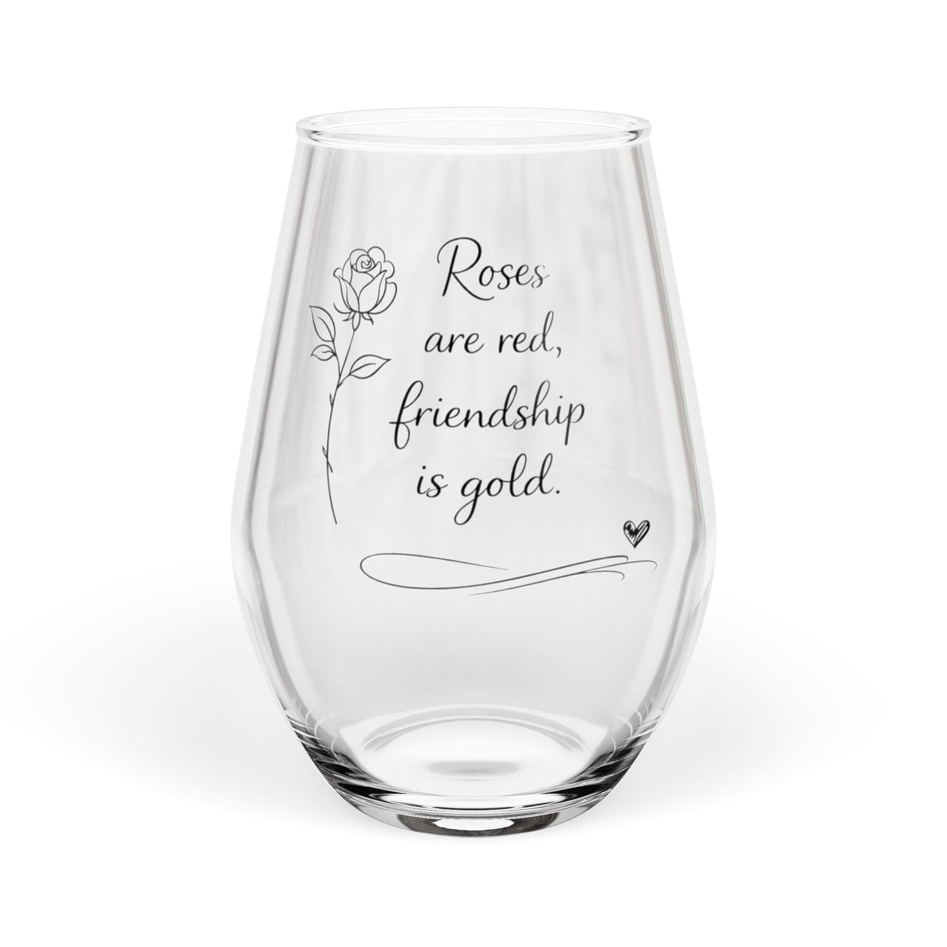 Clear glass with engraved text and a rose design on a white background