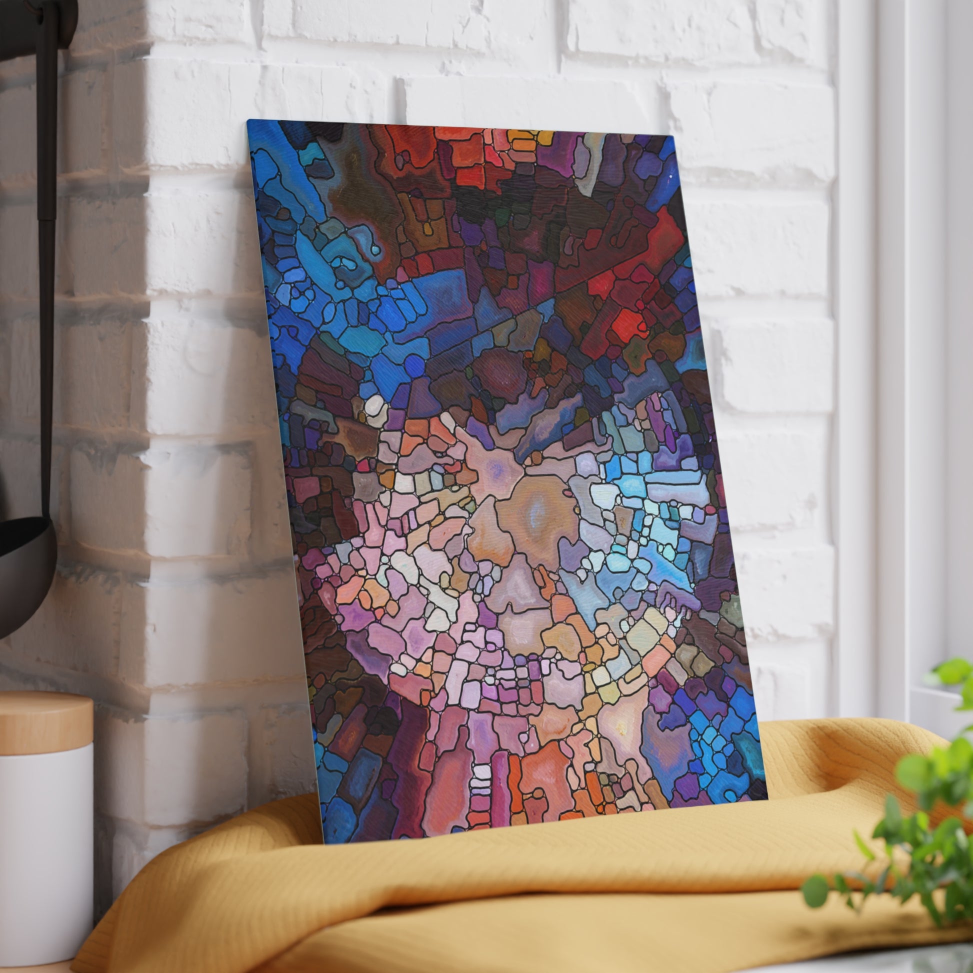Colorful abstract painting on a white brick wall