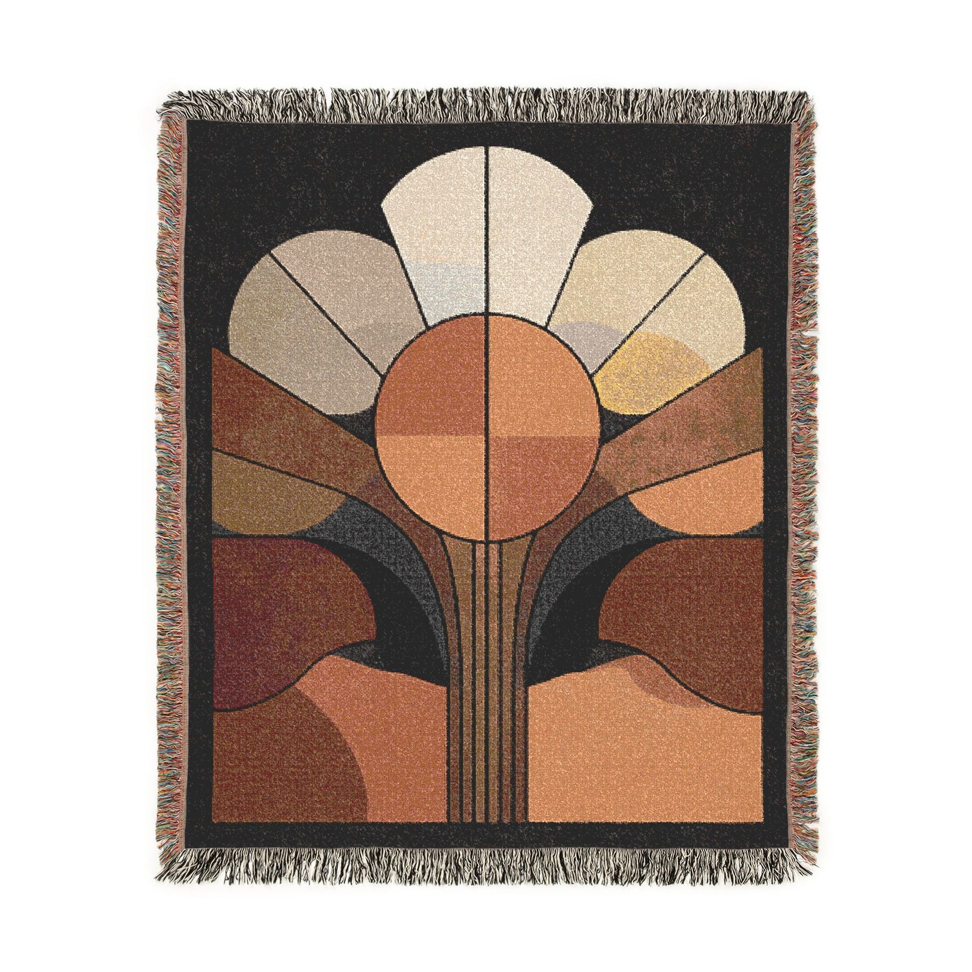 Woven blanket with abstract design featuring geometric shapes in earthy tones on a black background.
