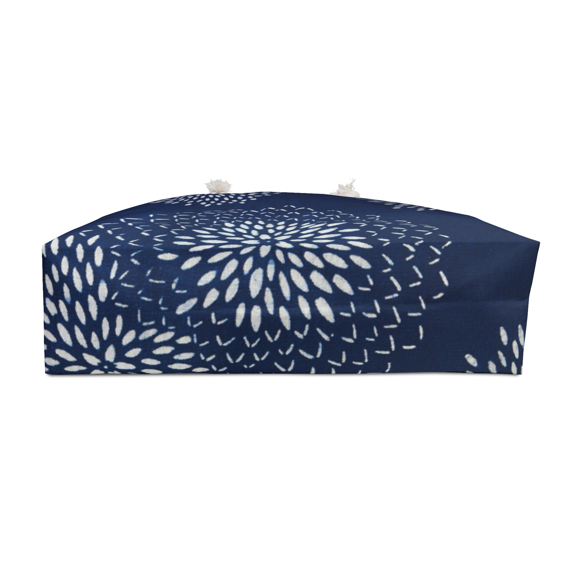 Navy blue bandeau top with white abstract pattern on a white background
