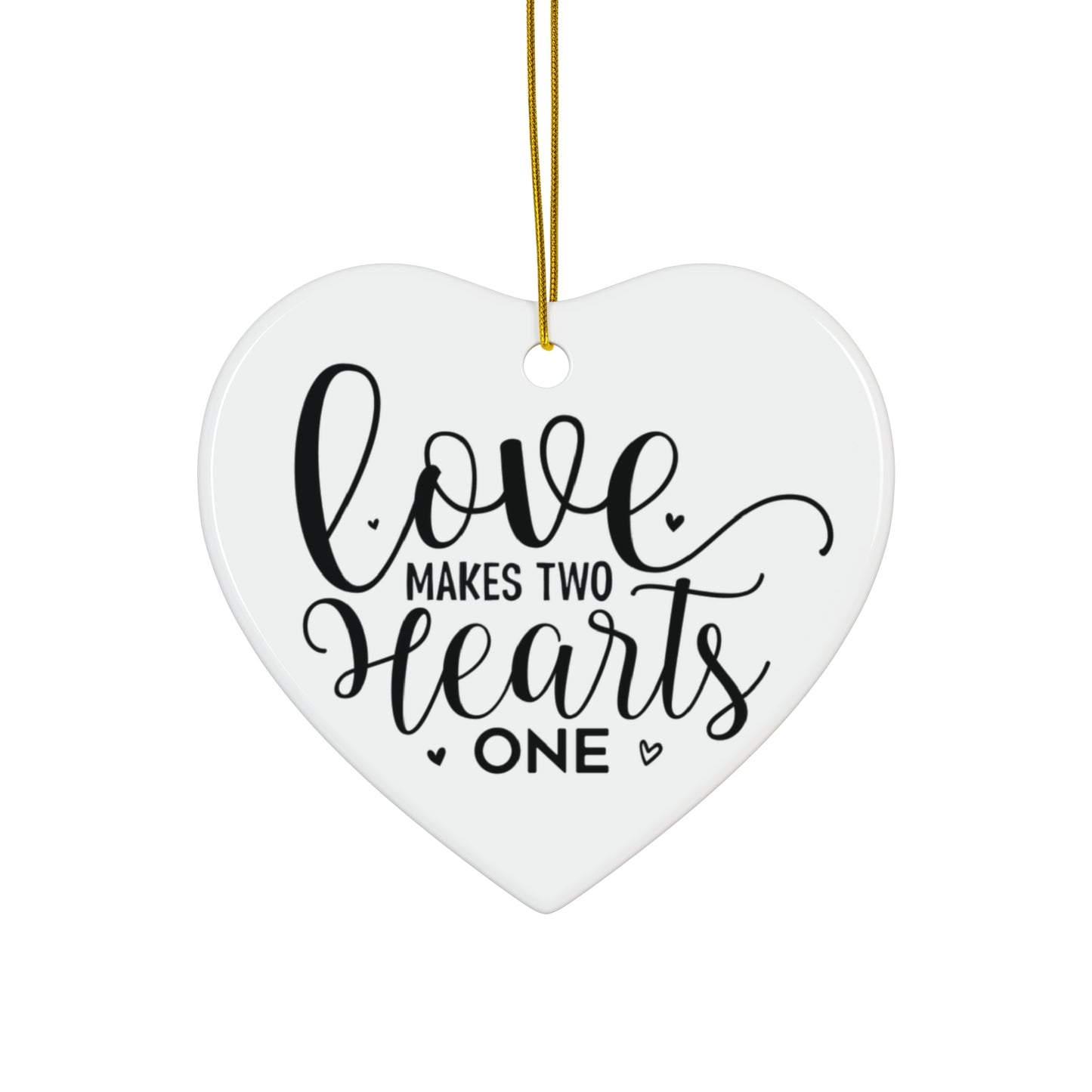 Heart-shaped ornament with 'Love makes two hearts one' text on a white background