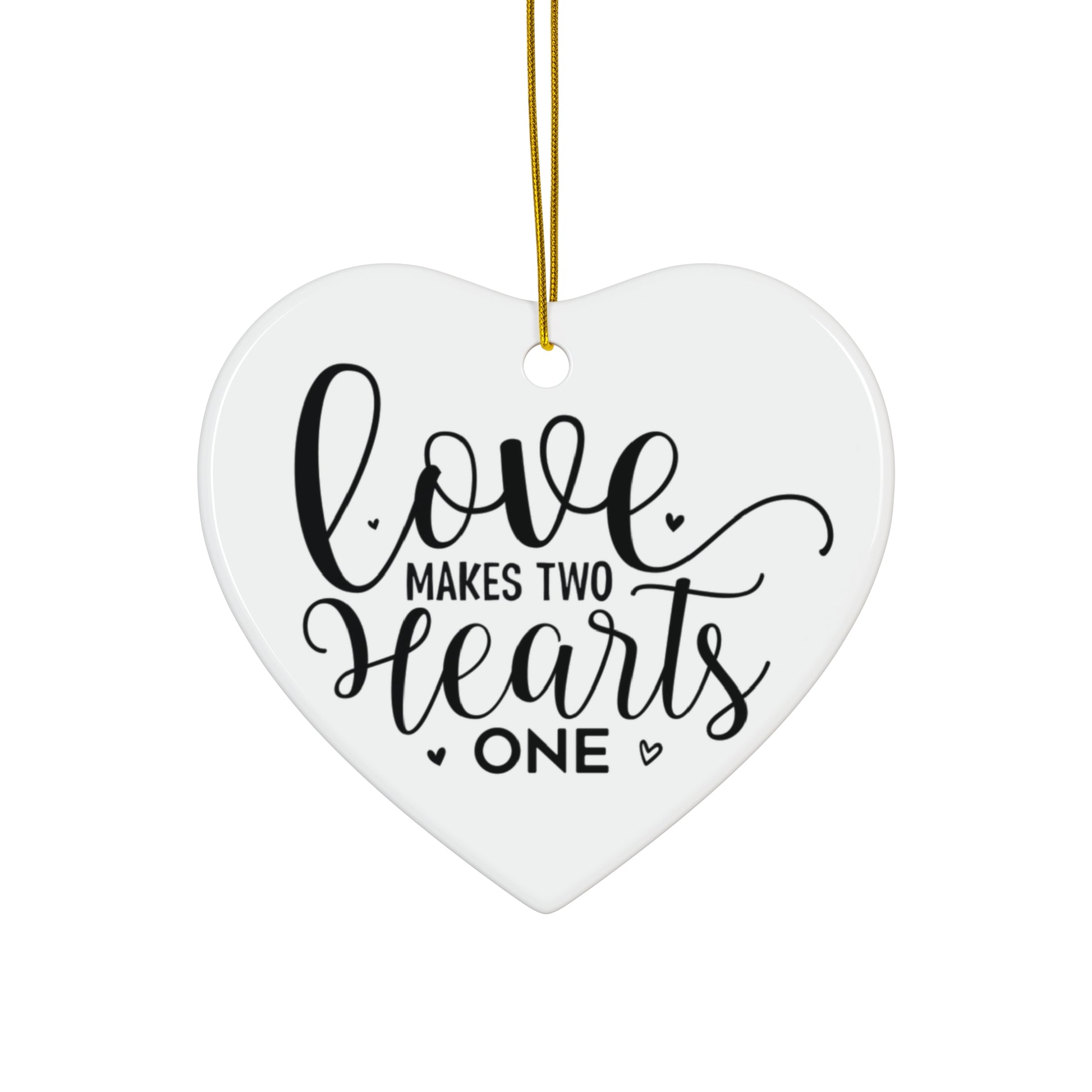 Heart-shaped ornament with 'Love makes two hearts one' text on a white background