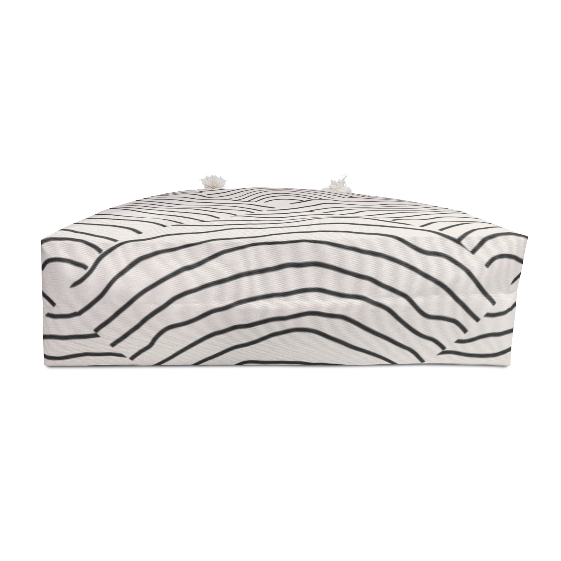 Zebra-patterned ottoman on a white background