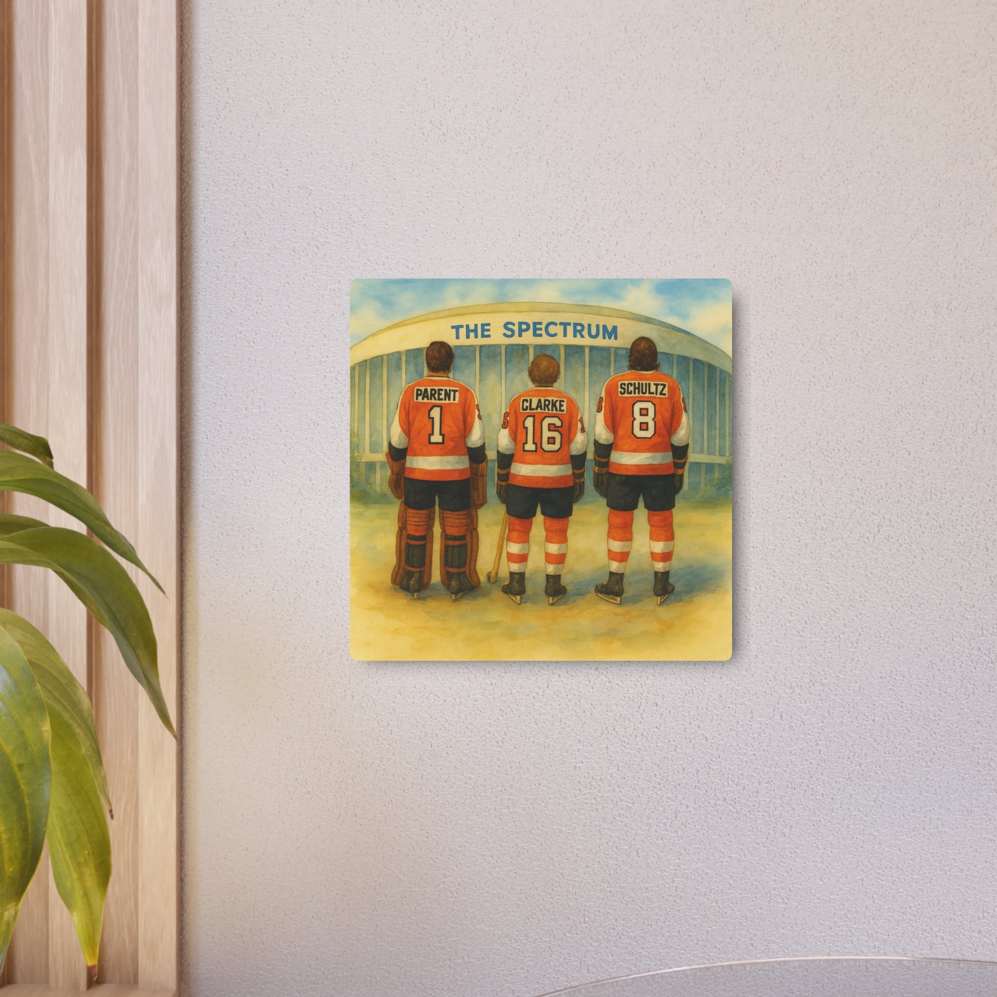 Art print of three hockey players in orange jerseys standing in front of 'The Spectrum' arena.