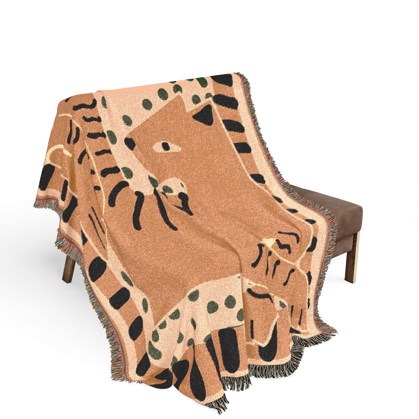 Decorative blanket with animal pattern draped over a chair on a white background