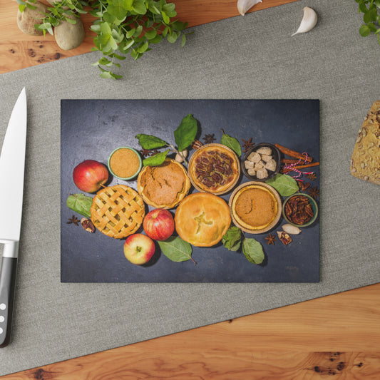 Decorative mat with pies and apples on a gray surface