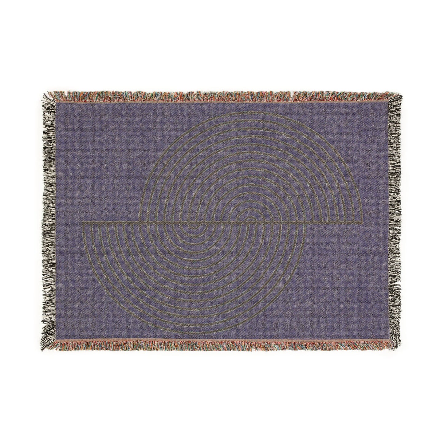 Decorative throw blanket with circular pattern on a plain background