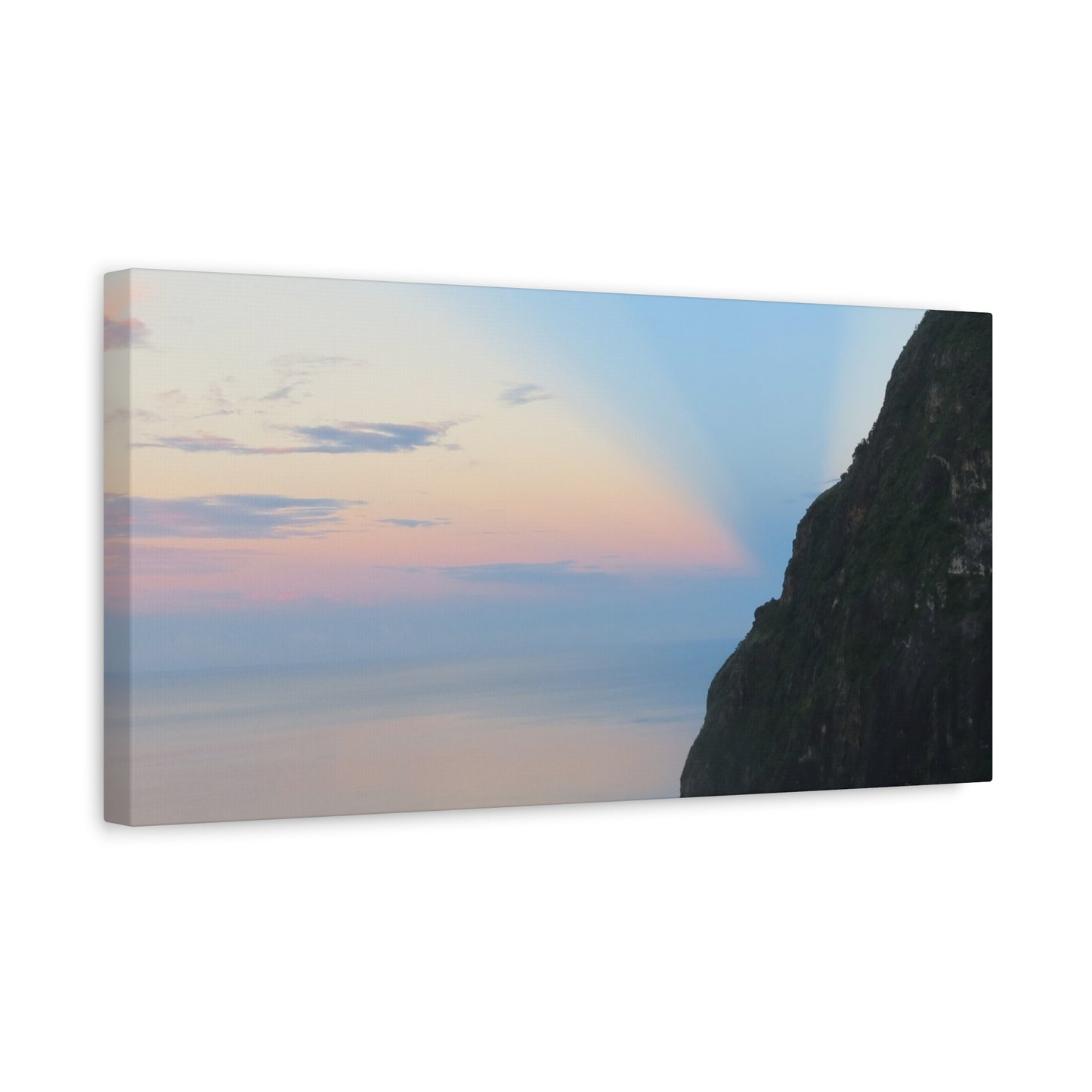 Canvas print of a mountain landscape with a sunset sky.