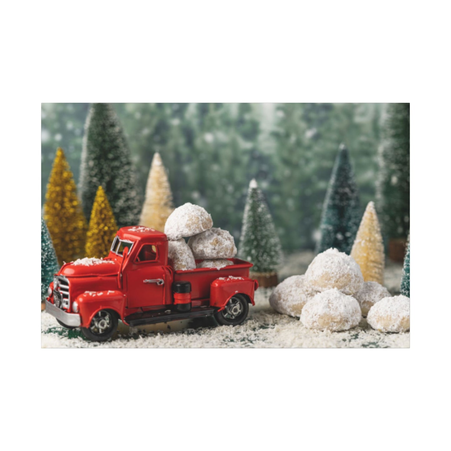 Red toy truck with snowballs in a snowy forest scene