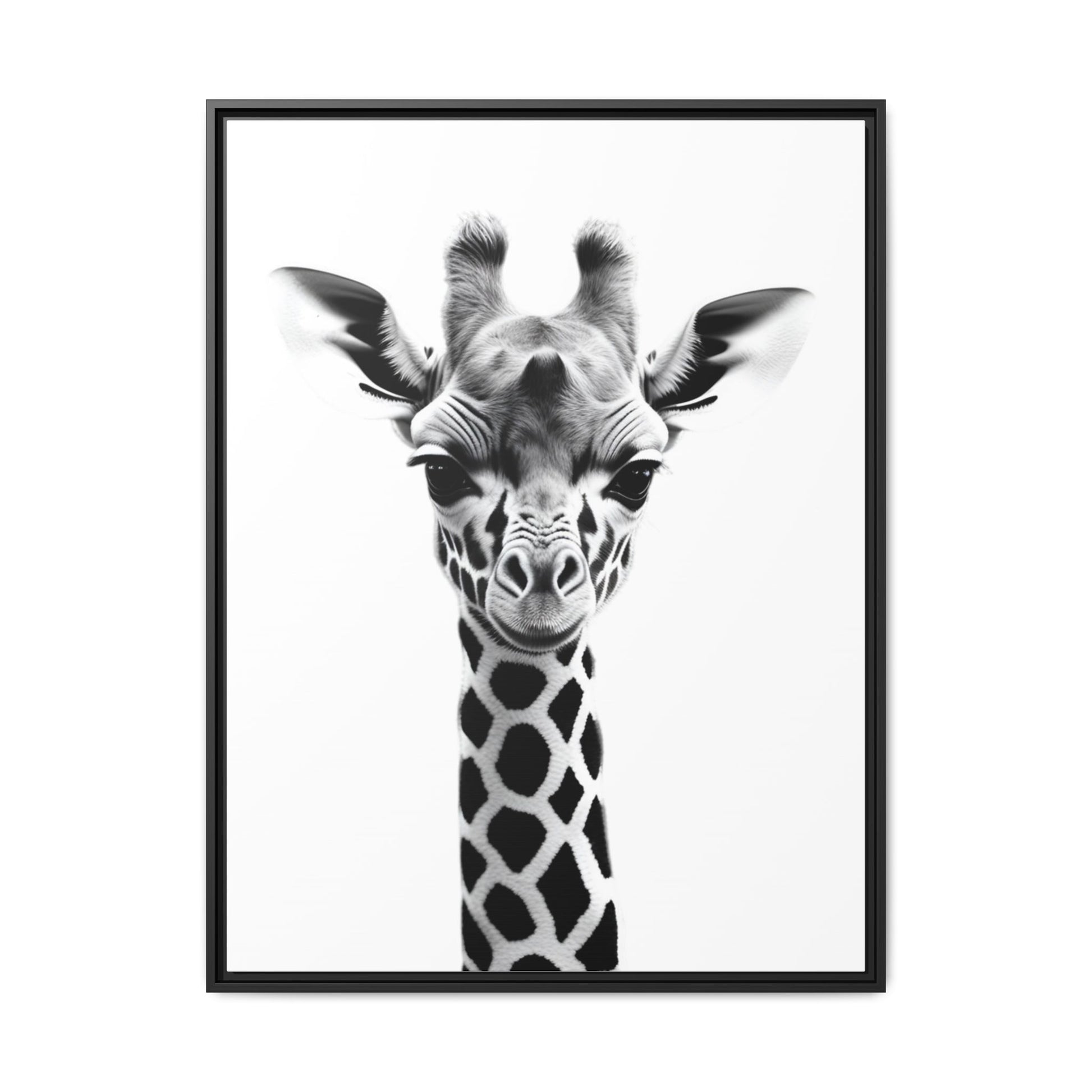 Framed black and white print of a giraffe's face on a white background