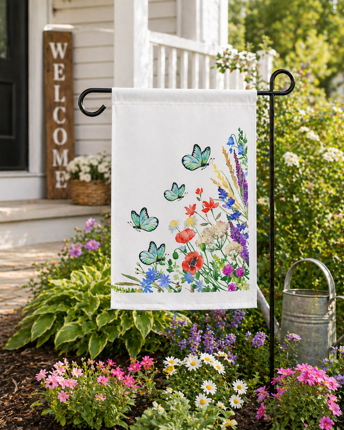 Decorative garden flag with butterflies and flowers on a stand in a garden setting.