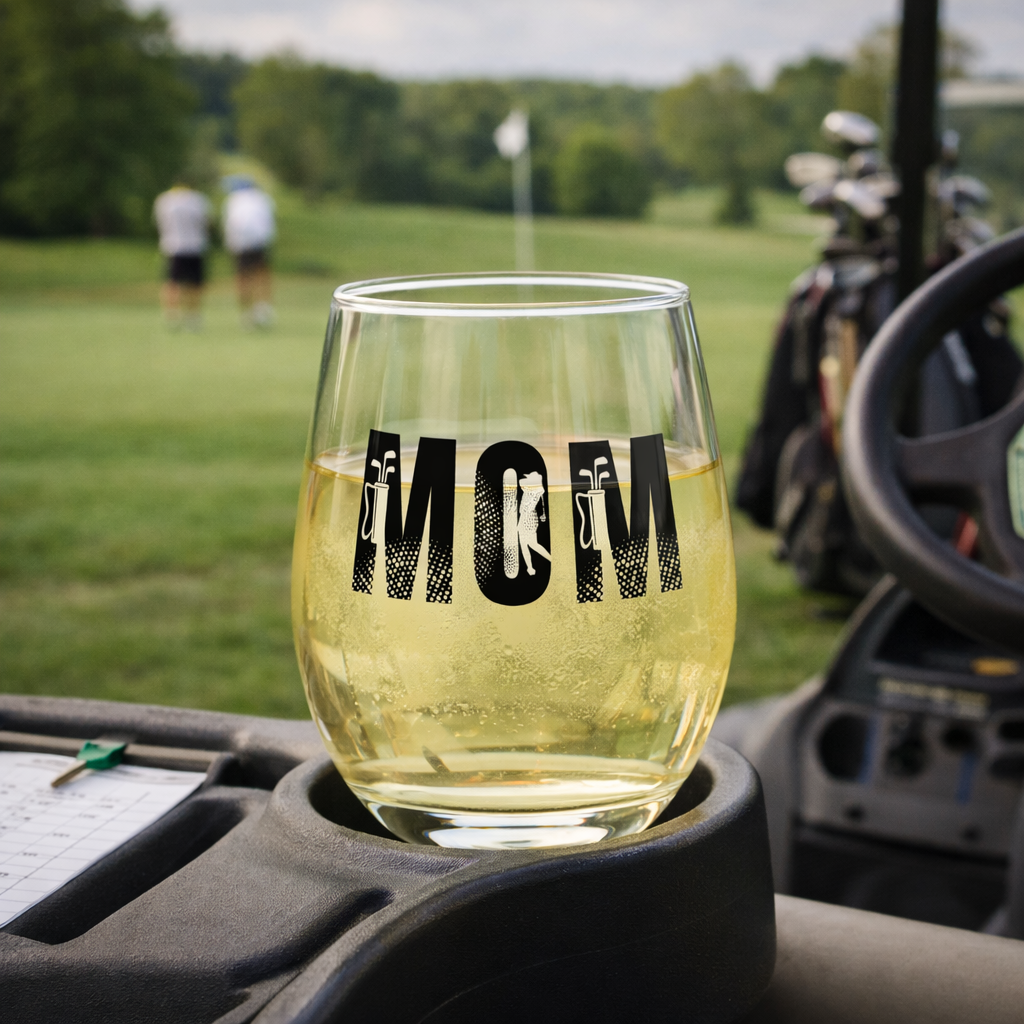 Glass with 'Mom' text on a golf cart with a golf course background