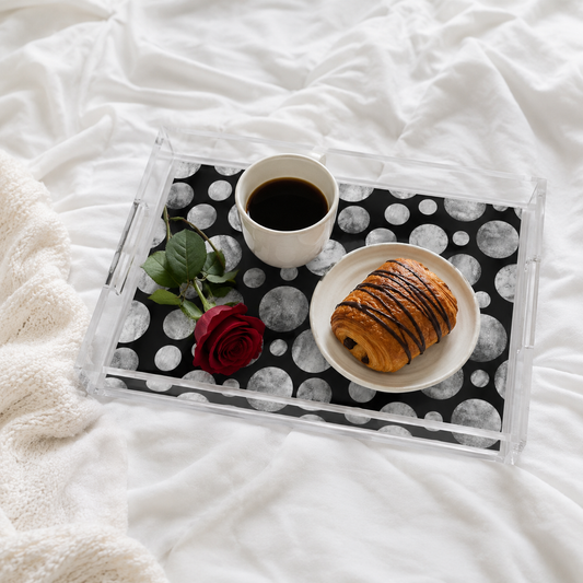 Tray with coffee and pastry on a white blanket